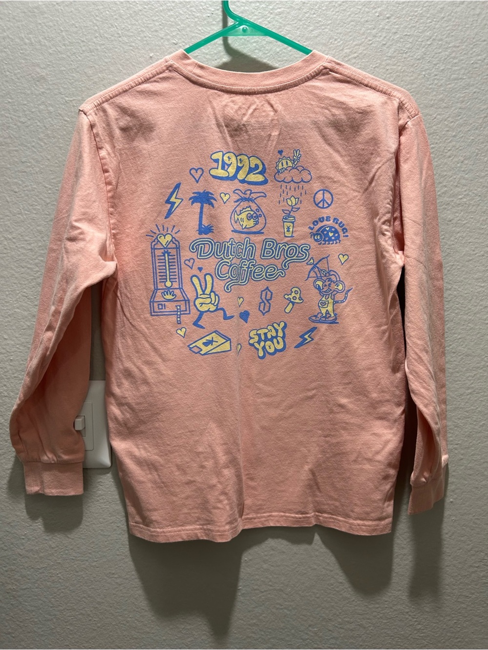 Dutch Bros Light Pink Long-Sleeve Tee with Blue & Yellow Graphic